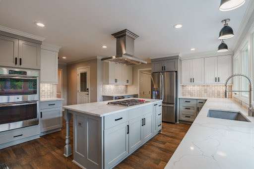 Great home layout with open kitchen with island, gray cabinets, and marble counter tops