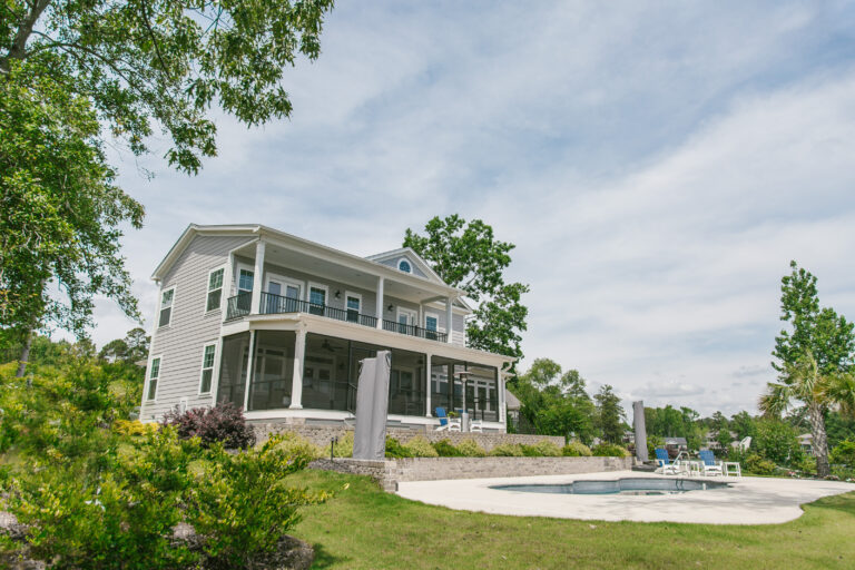 Two story home with additions completed by architects